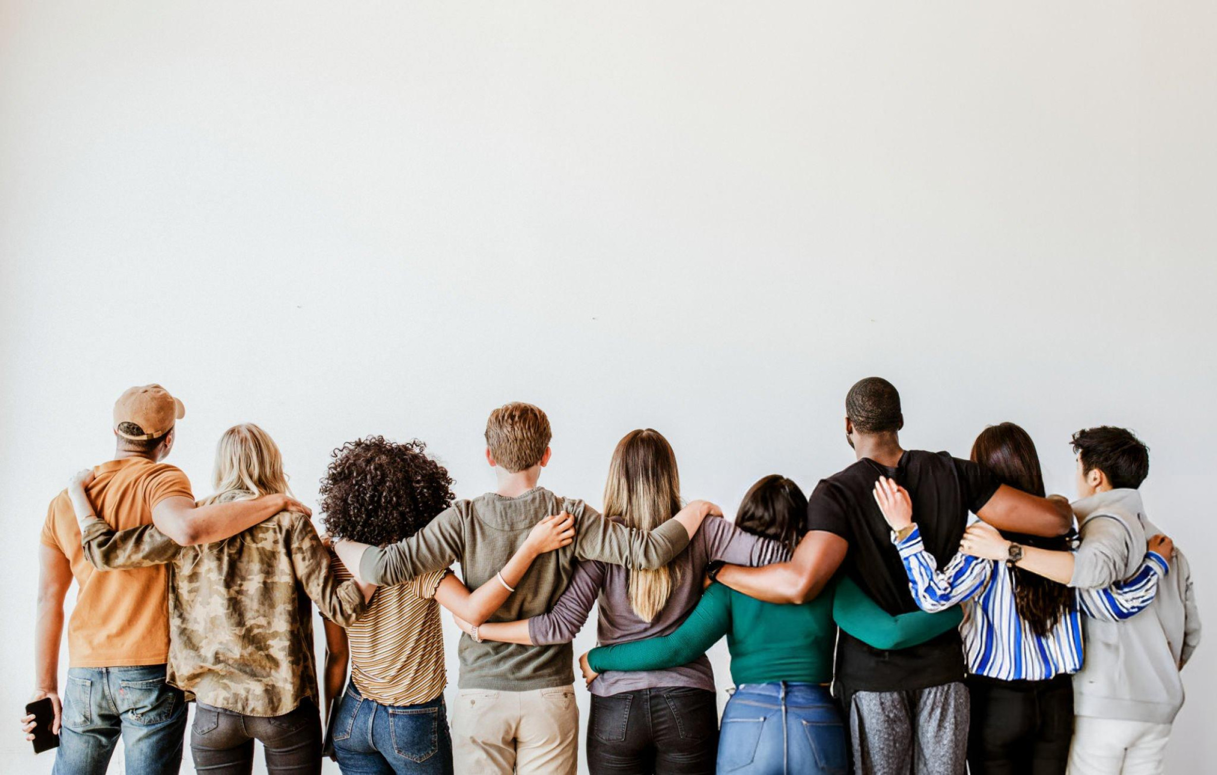 Group of diverse people standing together in unity